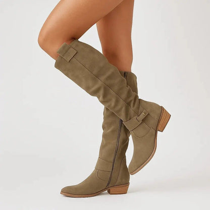Knee high side zipper boots worn by model